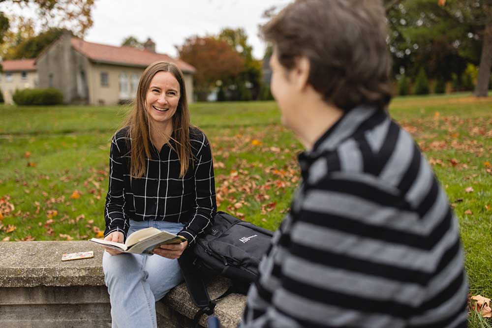 seminary students sitting outside