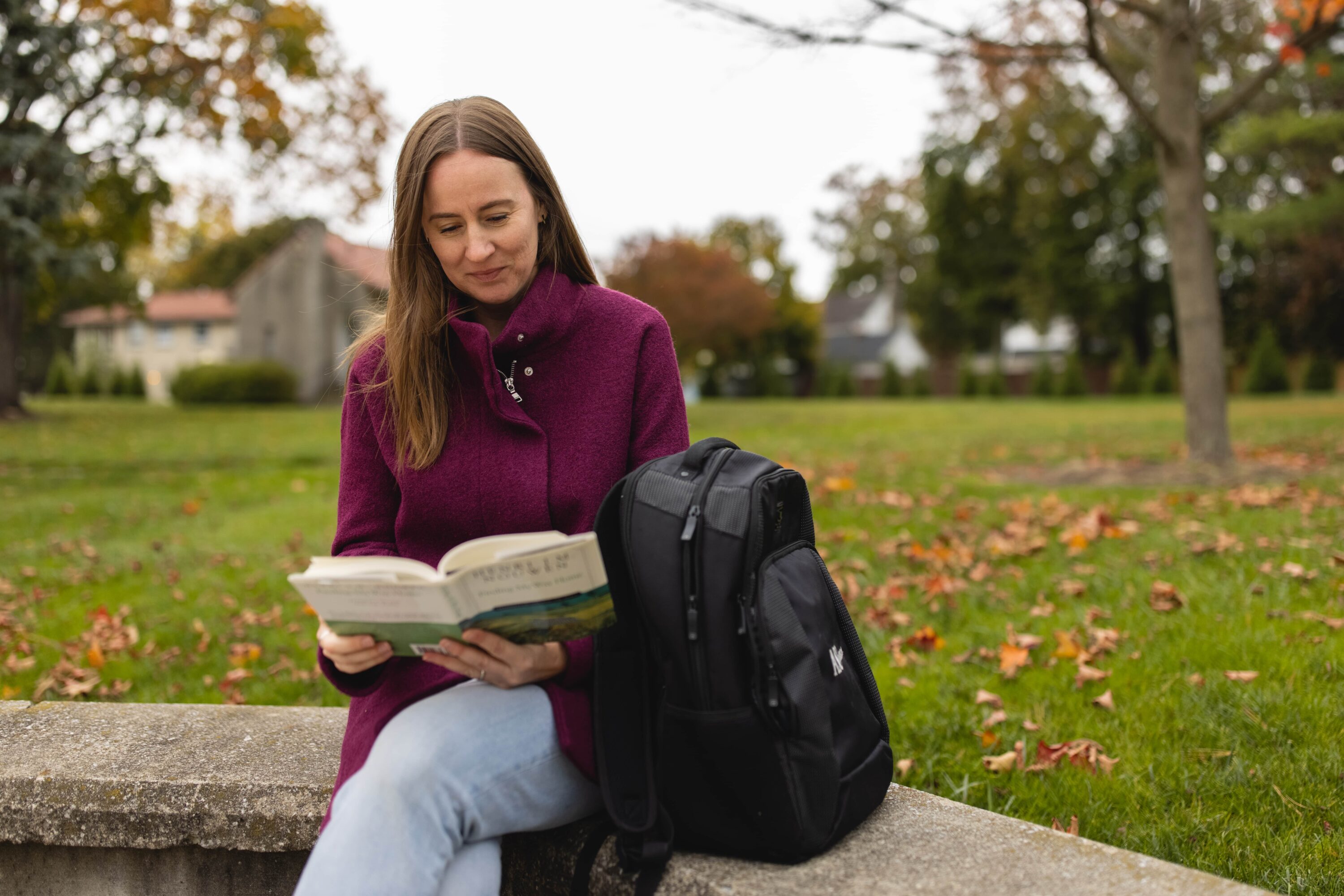 Student reading outside