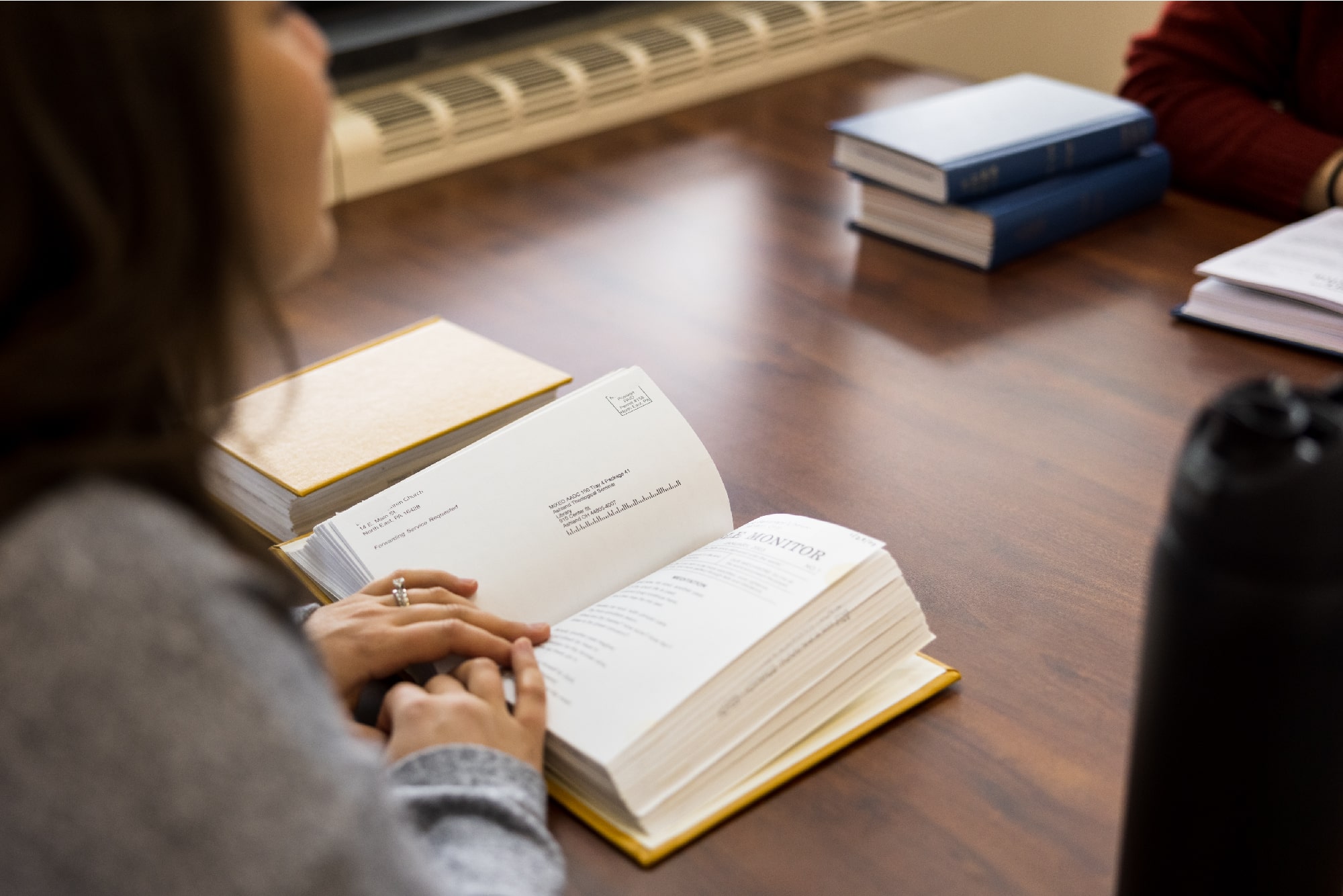 student reading a book