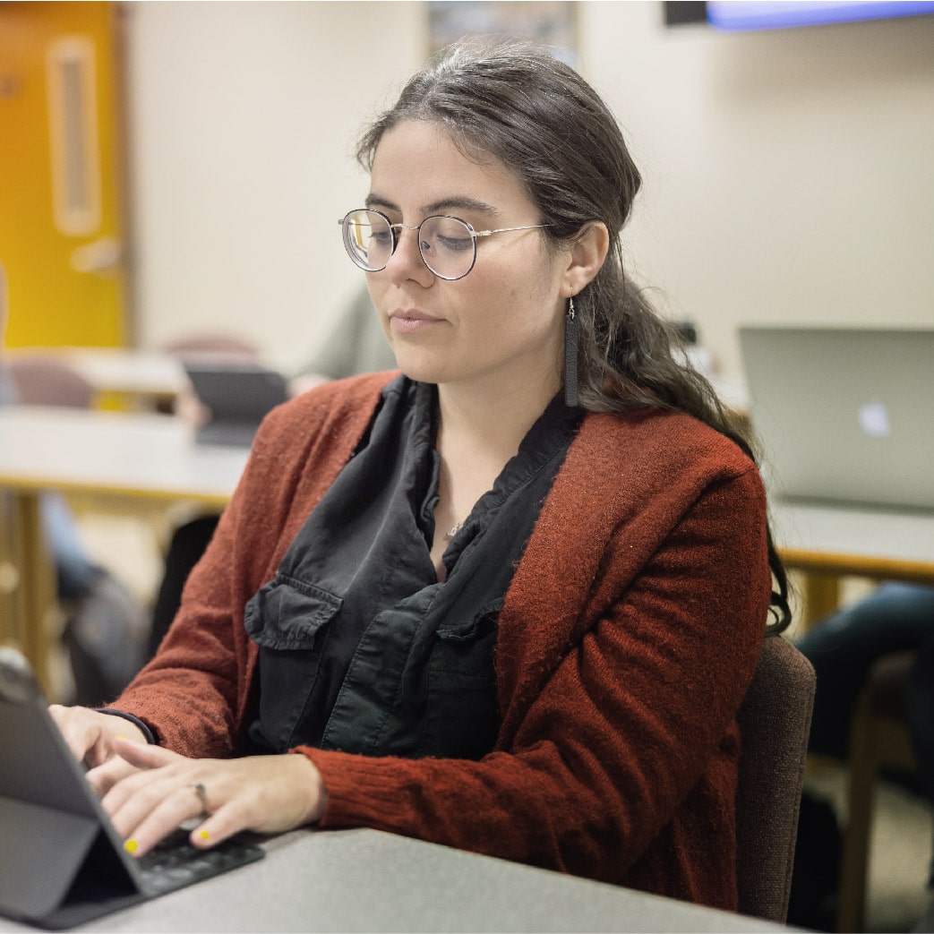 student working on computer