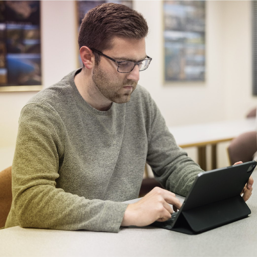 student working on computer