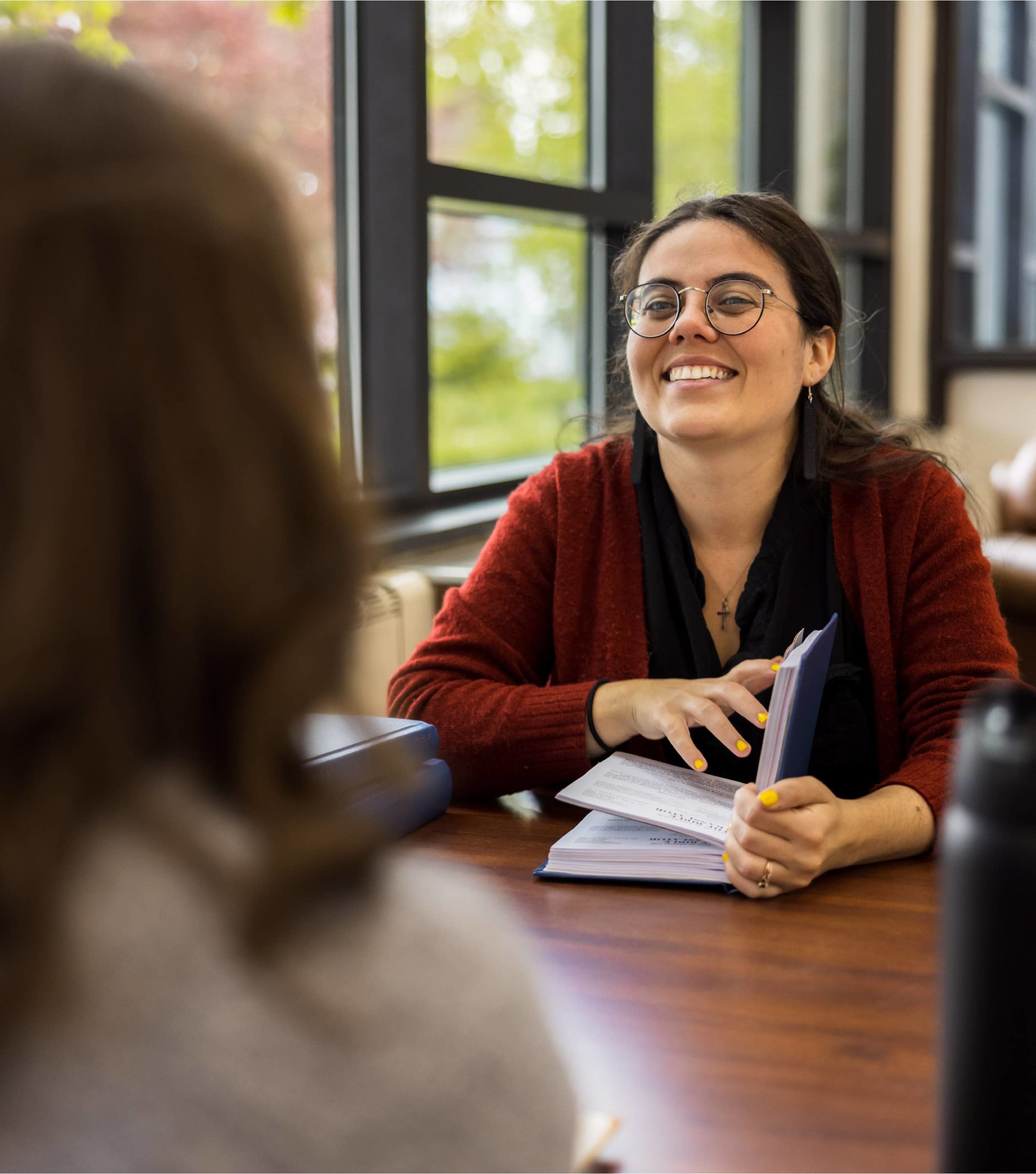 students sitting at table studying