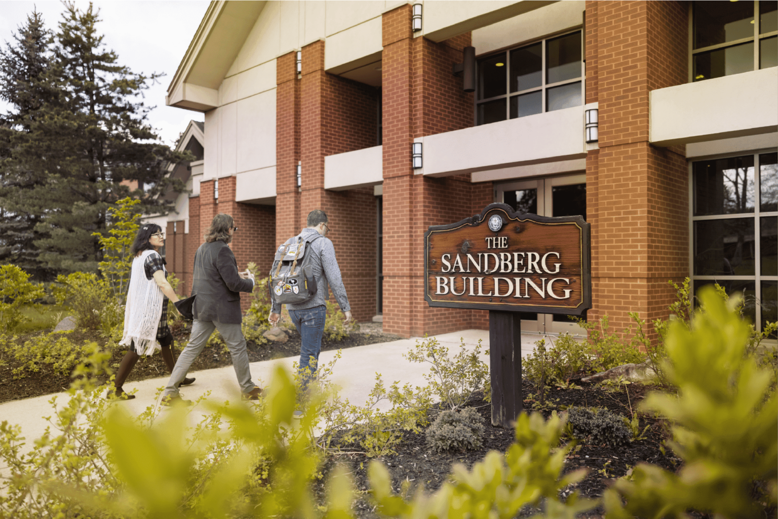 students entering the Sandberg Building