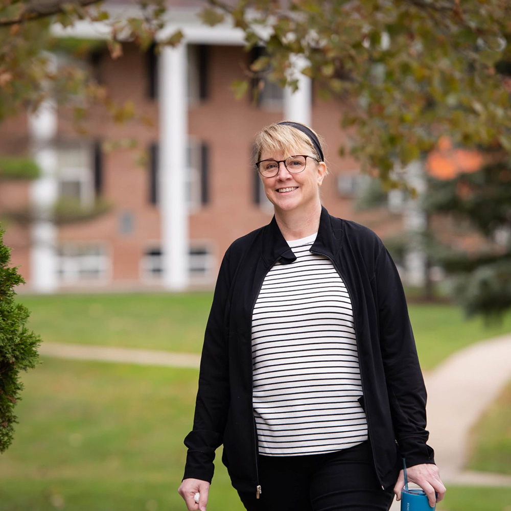 student walking on campus