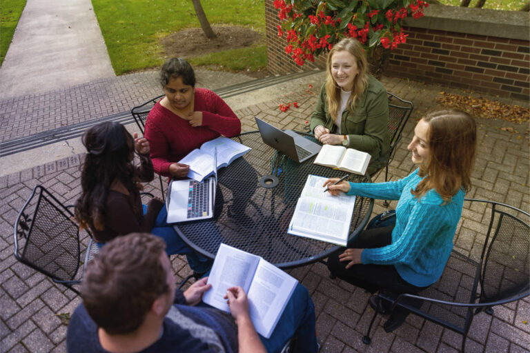 group of students at outdoor table